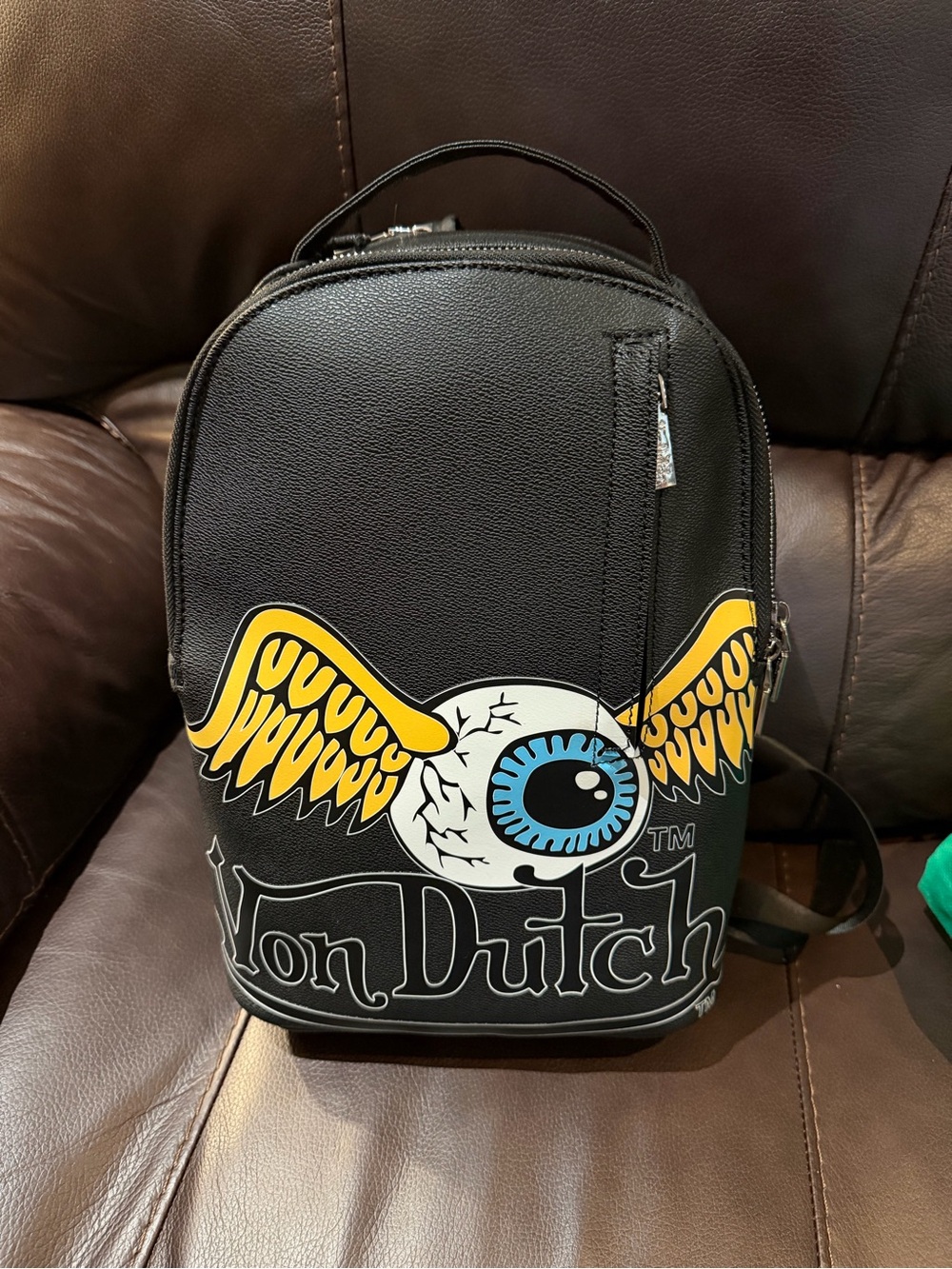 Von Dutch Black Mini Backpack with Yellow Winged Eye Graphic